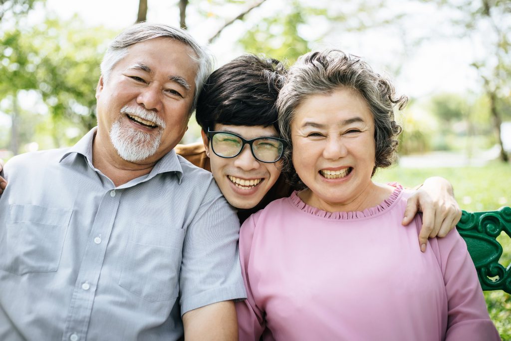 happy family having fun outdoors and smiling ZSN6C4G